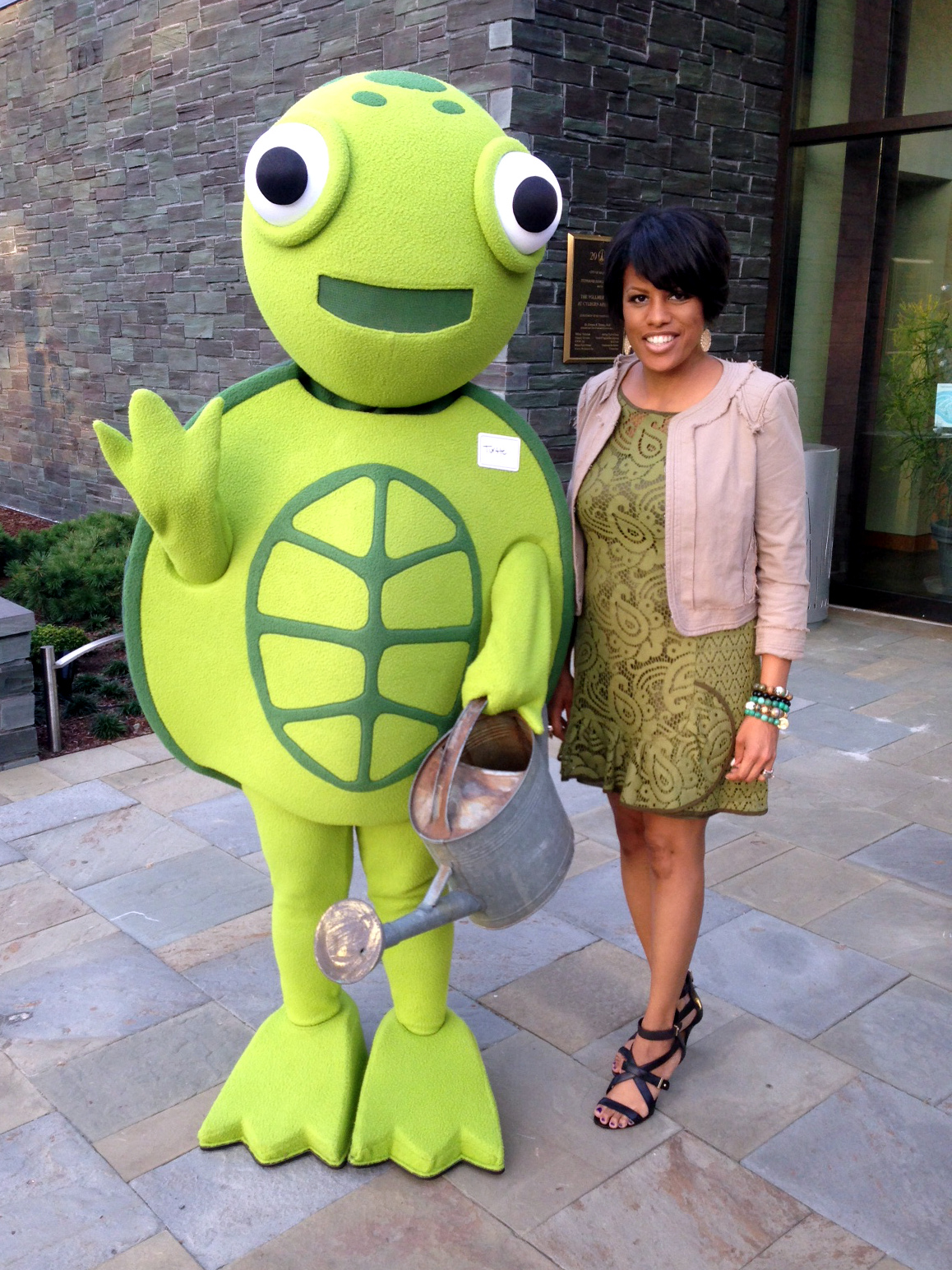 IMAGE: Mayor Rawlings-Blake poses with Turtle, mascot of the Growing Green Initiative